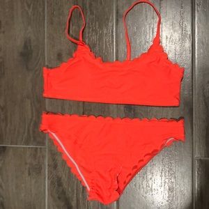 Bright coral orange scalloped two piece swim suit
